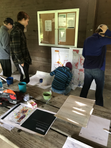 This image shows a group of students doing a mapping activity with racial covenants.