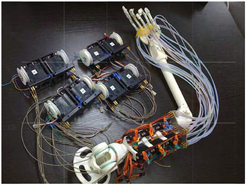 This image displays an example prosthetic arm with a brain-machine interface.