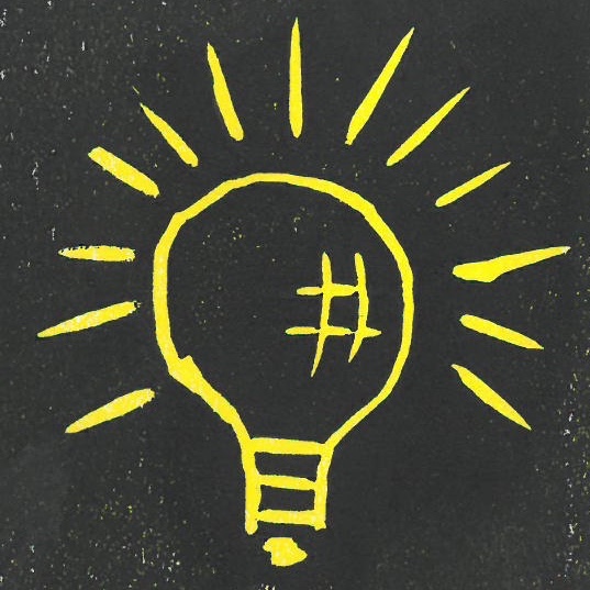 Drawing of a light bulb with rays of light coming out.